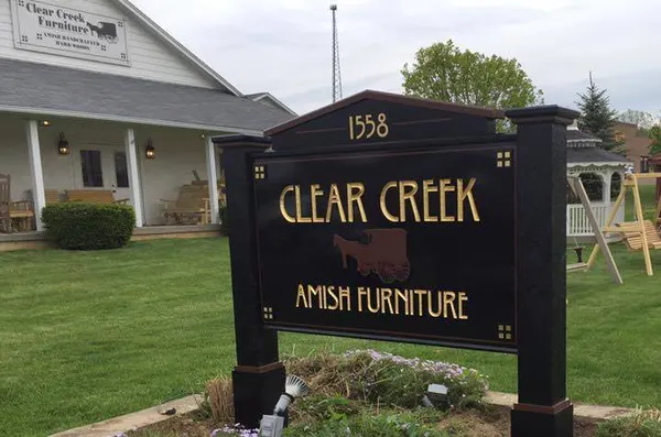 The Clear Creek Amish Furniture sign and showroom
